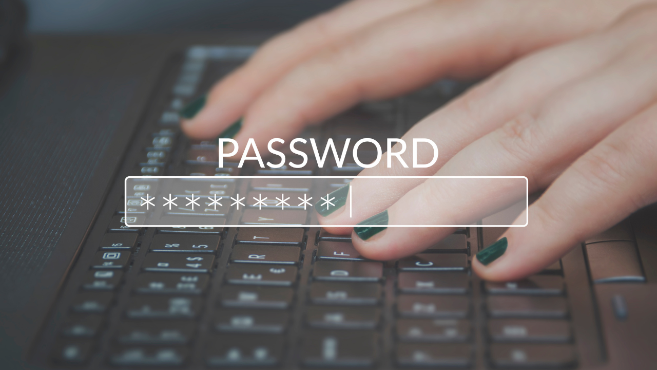 Woman's hands with green painted nails typing on a keyboard with a password entry image overlaid on top